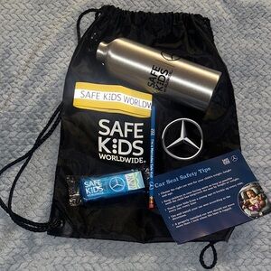 Black Drawstring Bag with Silver Water Bottle